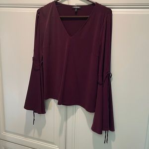 Plum express long sleeve flowy top with slit arms
